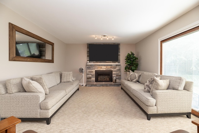 6615 Pleasantview Dr, Portage, MI 49024 - living room featuring a stone fireplace