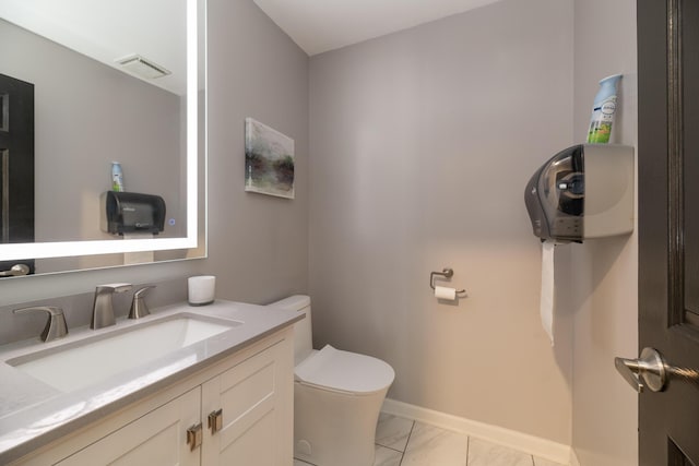 6615 Pleasantview Dr, Portage, MI 49024 - bathroom featuring marble look tile flooring and vanity