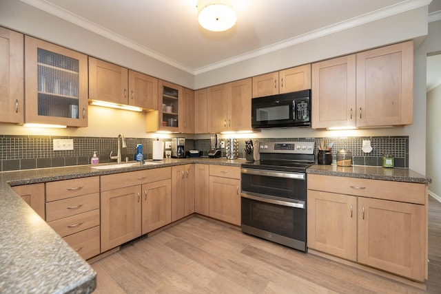 6615 Pleasantview Dr, Portage, MI 49024 - kitchen featuring light brown cabinetry, range with two ovens, black microwave, and crown molding