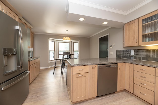 6615 Pleasantview Dr, Portage, MI 49024 - kitchen featuring appliances with stainless steel finishes, light brown cabinetry, a peninsula, light wood finished floors, and recessed lighting