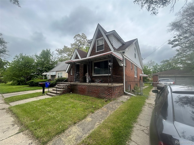 18602 Brinker St, Detroit, MI 48234 - view of front of house with brick siding and covered porch