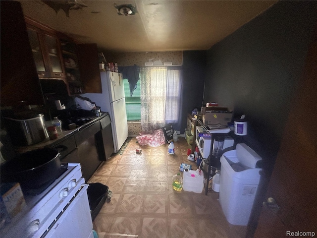 18602 Brinker St, Detroit, MI 48234 - kitchen featuring white electric range and light flooring