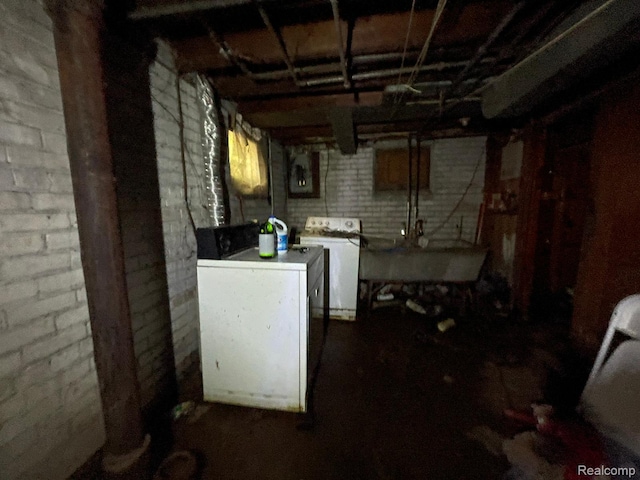 18602 Brinker St, Detroit, MI 48234 - unfinished basement featuring washer and dryer and a sink
