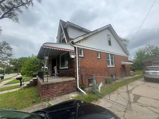 18602 Brinker St, Detroit, MI 48234 - view of side of property featuring brick siding