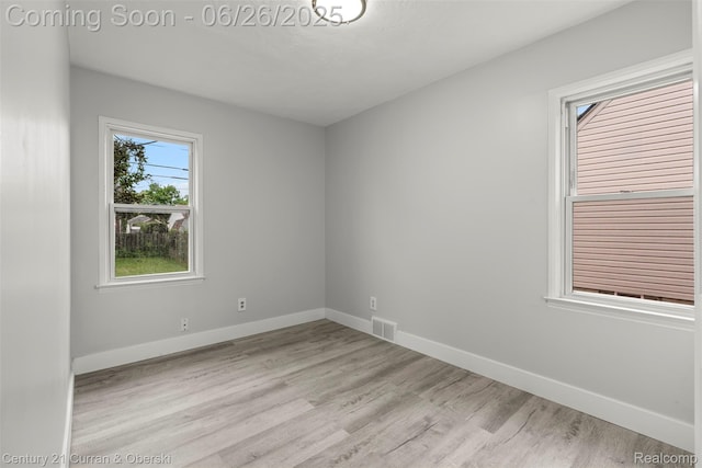 3244 Mckinley St, Canton, MI 48124 - empty room featuring light wood-type flooring and baseboards