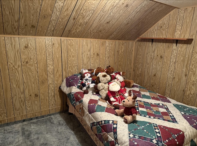 715 Filer Ave, Filer City, MI 49634 - carpeted bedroom with wooden ceiling, wood walls, and lofted ceiling