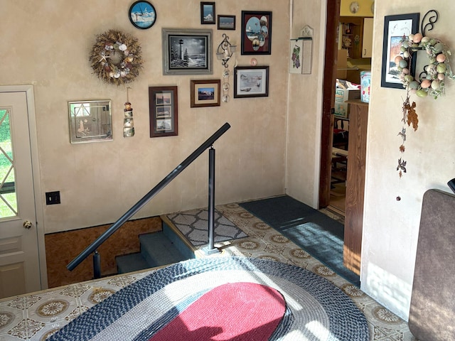 715 Filer Ave, Filer City, MI 49634 - stairway featuring carpet flooring