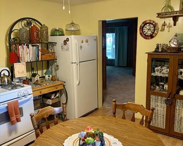 715 Filer Ave, Filer City, MI 49634 - kitchen featuring white appliances