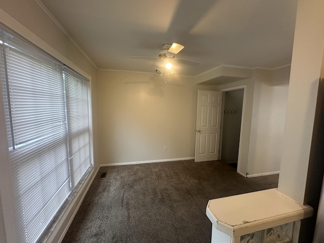 3002 Seaton Circuit N, Warren, MI 48091 - spare room featuring a ceiling fan and dark colored carpet