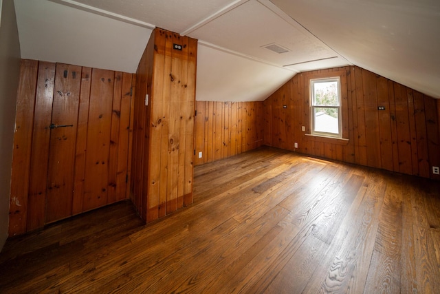 2712 Voorheis Rd, Waterford, MI 48328 - bonus room featuring hardwood / wood-style floors, lofted ceiling, and wood walls