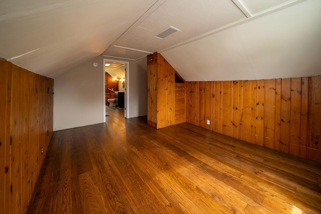 2712 Voorheis Rd, Waterford, MI 48328 - bonus room with wood finished floors, wooden walls, and lofted ceiling