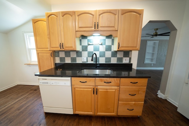 2712 Voorheis Rd, Waterford, MI 48328 - kitchen with white dishwasher, ceiling fan, dark stone counters, dark wood-style floors, and lofted ceiling
