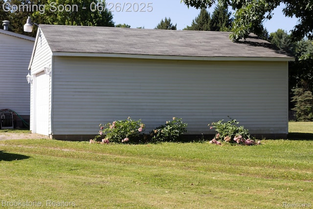 5022 Belsay Rd, Grand Blanc, MI 48439 - view of home's exterior featuring a lawn and a shingled roof
