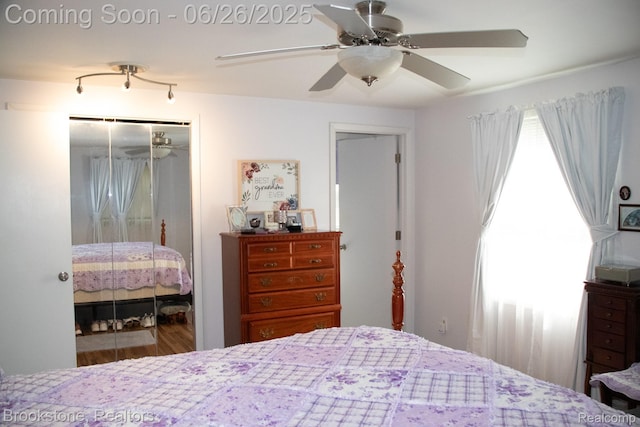 5022 Belsay Rd, Grand Blanc, MI 48439 - bedroom featuring wood finished floors, a closet, and ceiling fan