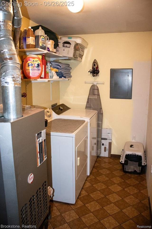 5022 Belsay Rd, Grand Blanc, MI 48439 - laundry area with washer and clothes dryer, electric panel, and tile patterned floors
