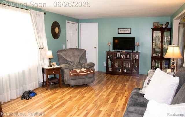 5022 Belsay Rd, Grand Blanc, MI 48439 - living room featuring wood finished floors and plenty of natural light