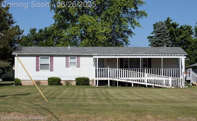 5022 Belsay Rd, Grand Blanc, MI 48439 - view of front of house featuring a front lawn, crawl space, and a porch