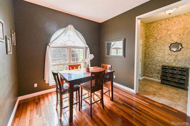 7396 Elms Rd, Swartz Creek, MI 48473 - dining space with wood finished floors and baseboards