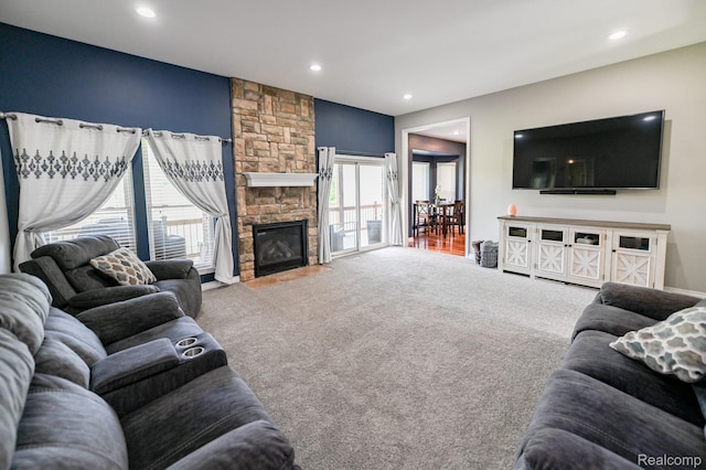 7396 Elms Rd, Swartz Creek, MI 48473 - living room with carpet floors, recessed lighting, and a fireplace