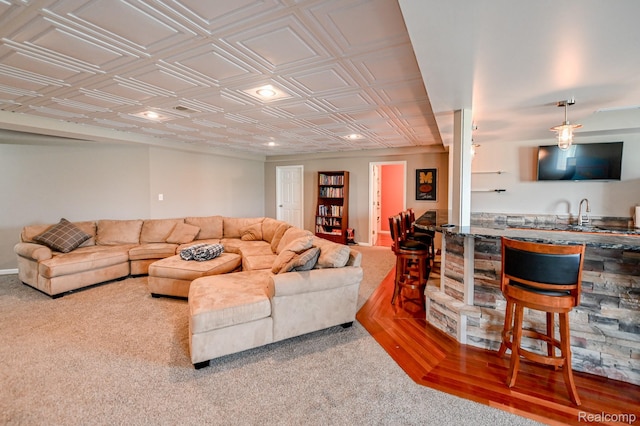 7396 Elms Rd, Swartz Creek, MI 48473 - living room featuring carpet, an ornate ceiling, bar with sink, and recessed lighting