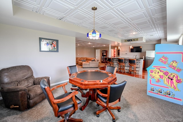 7396 Elms Rd, Swartz Creek, MI 48473 - game room with an ornate ceiling, a community bar, and carpet flooring