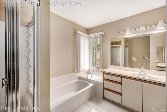 2184 Reagan Dr, Rochester Hills, MI 48309 - full bath with tile patterned floors, vanity, a shower stall, and a bath
