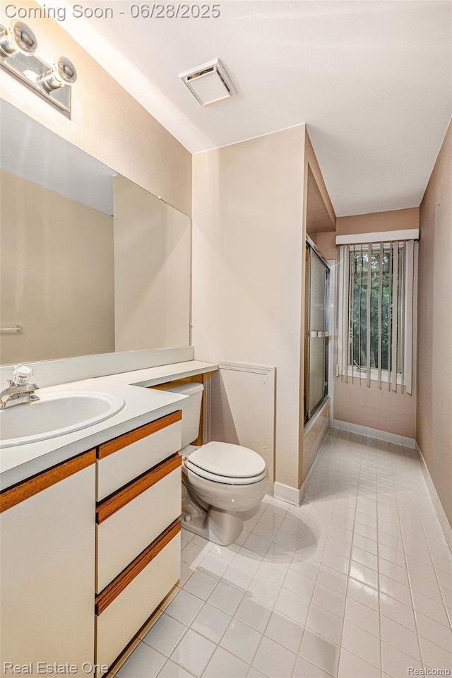 2184 Reagan Dr, Rochester Hills, MI 48309 - bathroom featuring tile patterned floors and vanity