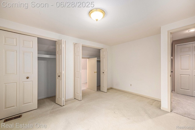 2184 Reagan Dr, Rochester Hills, MI 48309 - unfurnished bedroom featuring light colored carpet and a closet