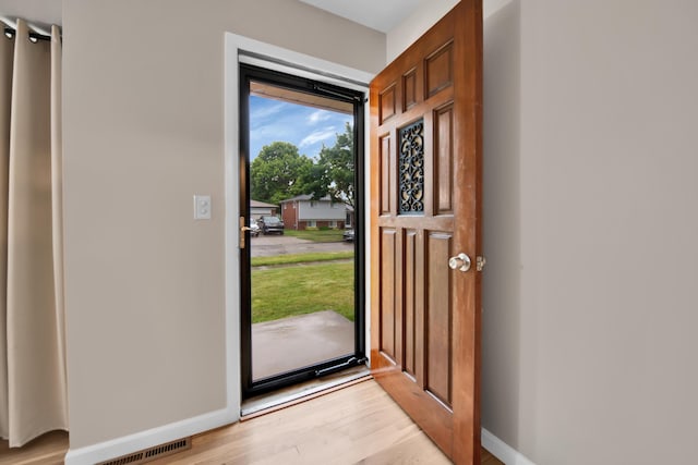27152 Broadmoor Dr, Warren, MI 48088 - foyer entrance with light wood-type flooring and baseboards