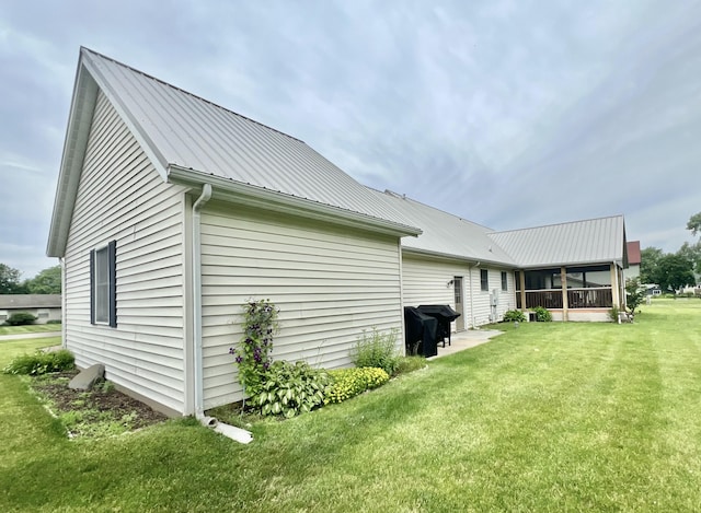 755 Tomahawk Trl, Coldwater, MI 49036 - rear view of property with a yard and a metal roof
