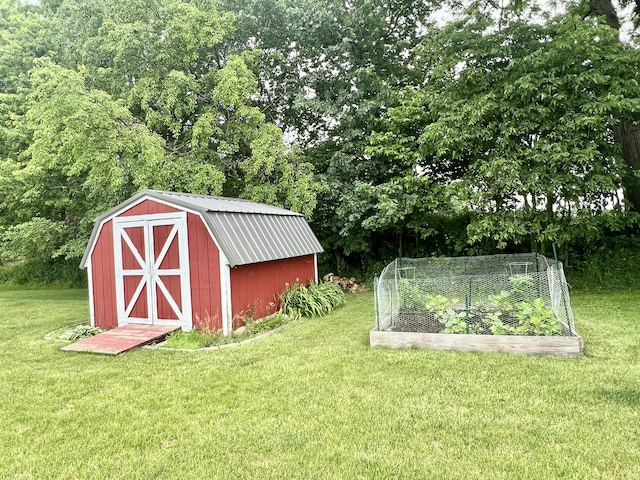 755 Tomahawk Trl, Coldwater, MI 49036 - view of shed with a vegetable garden