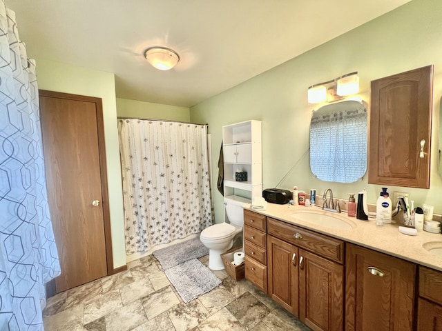755 Tomahawk Trl, Coldwater, MI 49036 - bathroom with double vanity, stone finish flooring, and a shower with curtain