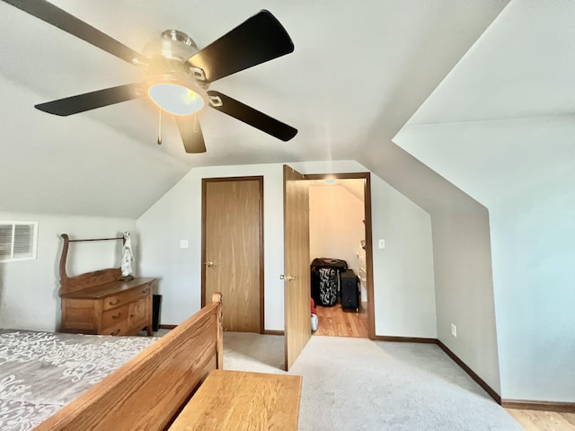 755 Tomahawk Trl, Coldwater, MI 49036 - bedroom with vaulted ceiling, carpet, and ceiling fan