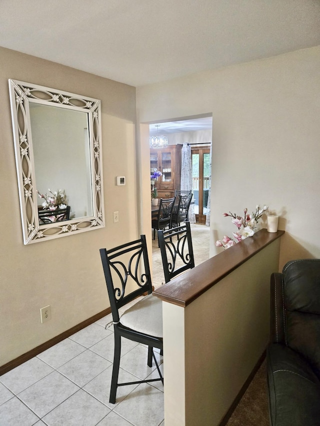 755 Tomahawk Trl, Coldwater, MI 49036 - tiled dining room featuring baseboards