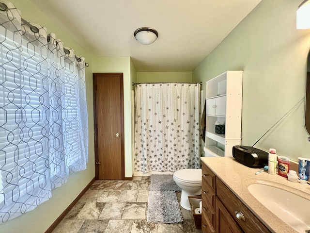 755 Tomahawk Trl, Coldwater, MI 49036 - full bath featuring vanity, stone finish floors, curtained shower, and healthy amount of natural light