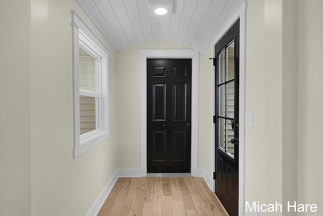 3054 Sehler St, Conklin, MI 49403 - foyer entrance with lofted ceiling, light wood-type flooring, and wooden ceiling
