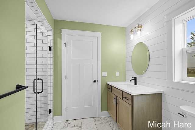 3054 Sehler St, Conklin, MI 49403 - full bathroom with vanity, marble look tiles, wooden walls, and a shower stall