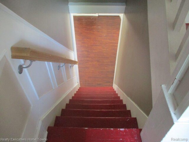 1027 Elmwood St, Port Huron, MI 48060 - stairs featuring wood finished floors