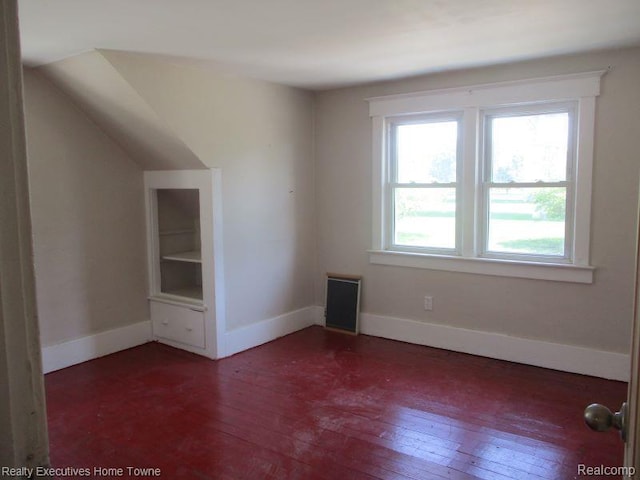 1027 Elmwood St, Port Huron, MI 48060 - additional living space featuring hardwood / wood-style floors and lofted ceiling