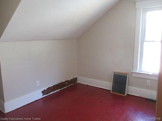 1027 Elmwood St, Port Huron, MI 48060 - bonus room featuring lofted ceiling and wood finished floors