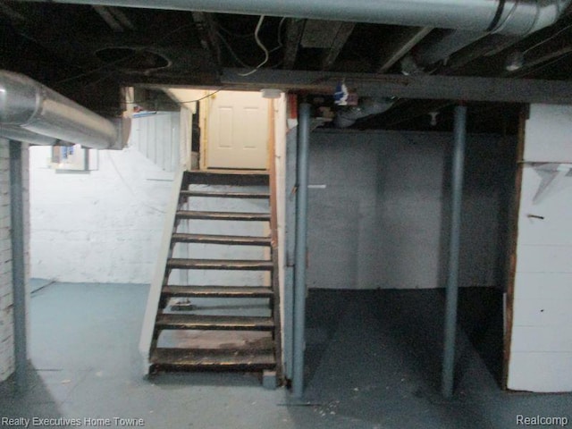 1027 Elmwood St, Port Huron, MI 48060 - unfinished basement with stairway