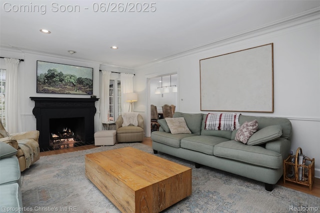 753 Grand Marais St, Grosse Pointe Park, MI 48230 - living room featuring ornamental molding, a fireplace with flush hearth, wood finished floors, and recessed lighting