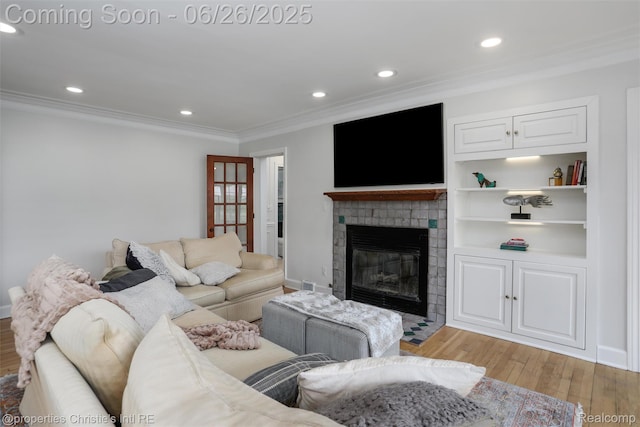 753 Grand Marais St, Grosse Pointe Park, MI 48230 - living area with crown molding, light wood finished floors, recessed lighting, and a fireplace with flush hearth