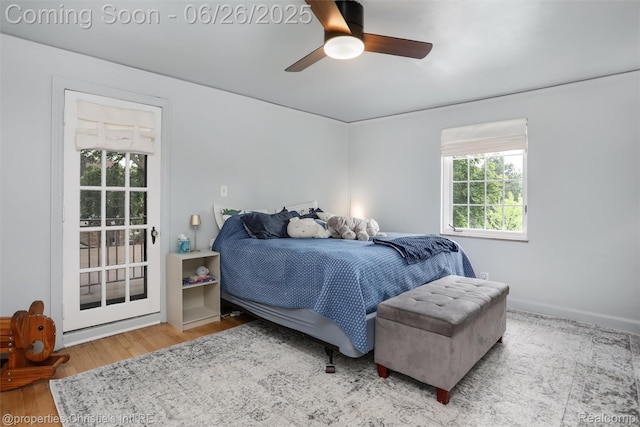 753 Grand Marais St, Grosse Pointe Park, MI 48230 - bedroom with multiple windows, wood finished floors, and ceiling fan