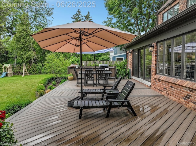 753 Grand Marais St, Grosse Pointe Park, MI 48230 - wooden deck with a yard, outdoor dining space, a playground, and area for grilling