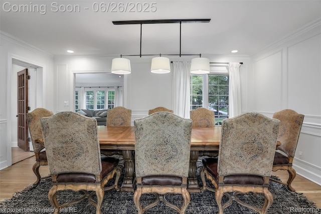 753 Grand Marais St, Grosse Pointe Park, MI 48230 - dining area with wood finished floors, ornamental molding, a decorative wall, and recessed lighting