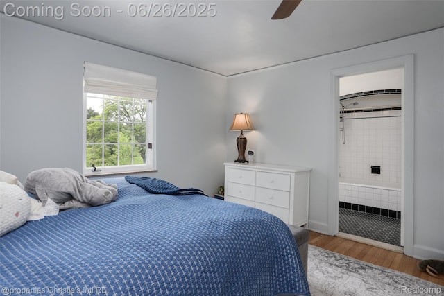 753 Grand Marais St, Grosse Pointe Park, MI 48230 - bedroom featuring wood finished floors, connected bathroom, and a ceiling fan