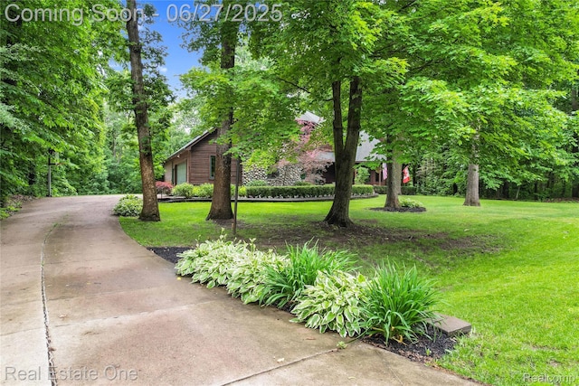 2300 Canyon Ridge Dr, White Lake, MI 48383 - view of front of property featuring a front lawn