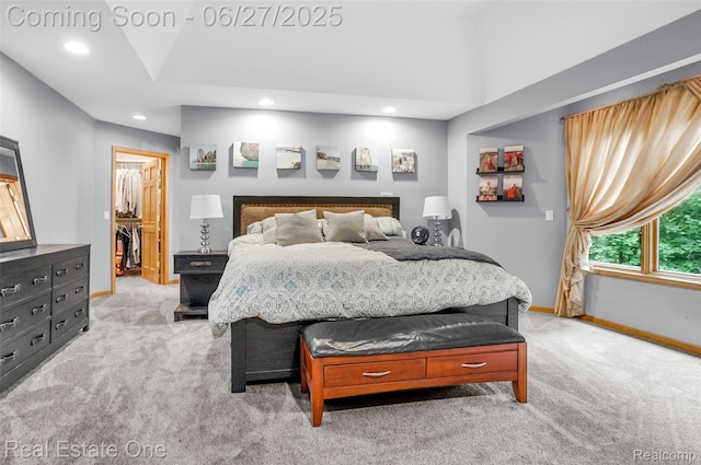 2300 Canyon Ridge Dr, White Lake, MI 48383 - bedroom featuring light colored carpet, recessed lighting, and a walk in closet