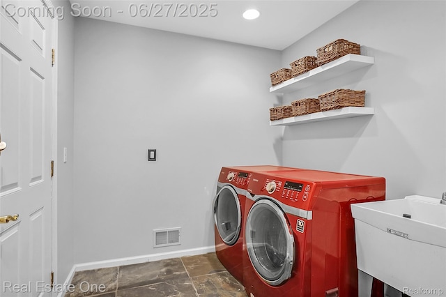 2300 Canyon Ridge Dr, White Lake, MI 48383 - laundry area featuring washing machine and dryer and baseboards